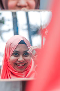 Portrait of a smiling young woman