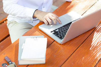 High angle view of man working on table