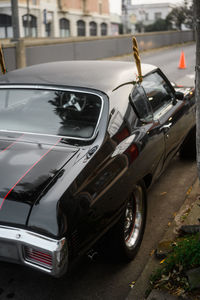 Cars parked on street in city