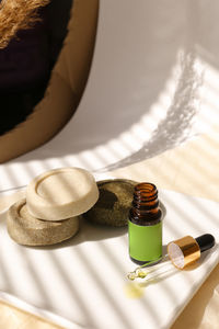 High angle view aromatherapy products on table