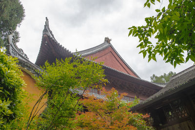 Low angle view of traditional building against sky