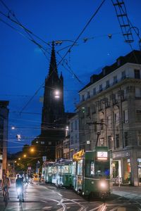 Illuminated city street at night