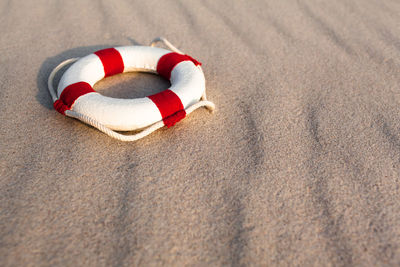 High angle view of heart shape on sand