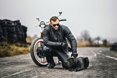 Man riding bicycle on road