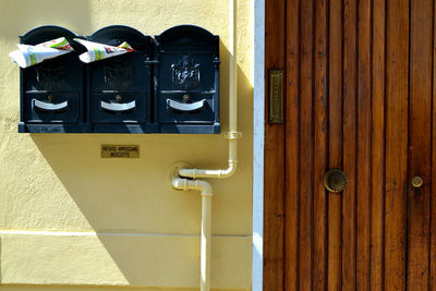 Close-up of closed window on wall