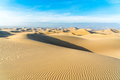 Scenic view of desert against sky