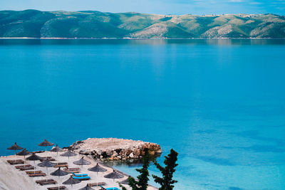 Scenic view of swimming pool by lake