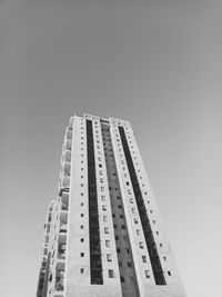 Low angle view of modern building against clear sky