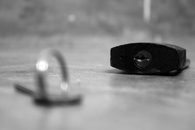 Close-up of metal on table