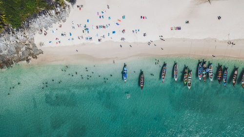 High angle view of people on sea shore