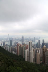 Modern buildings in city against sky