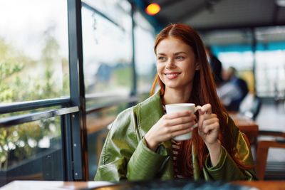 Young woman using mobile phone