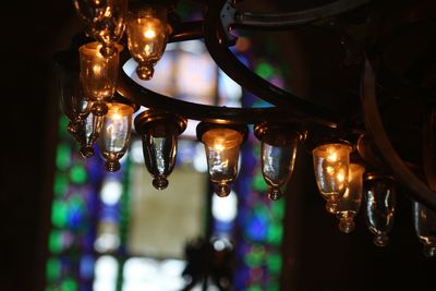 Low angle view of illuminated chandelier