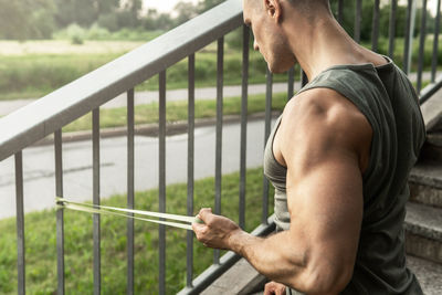 Low section of man exercising outdoors