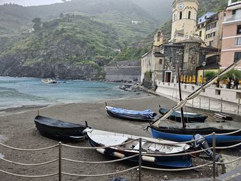 Boats moored at harbor