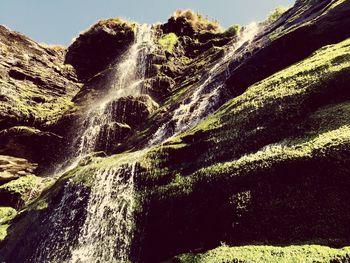 Scenic view of rock formation against sky