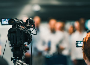 Video camera against people in event