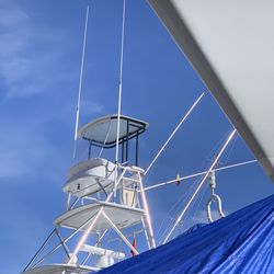Low angle view of lookout point on luxury yacht against sky in fuengirola, spain.