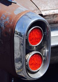 Close-up of red vintage car