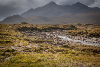 Scenic view of river flowing through rocks