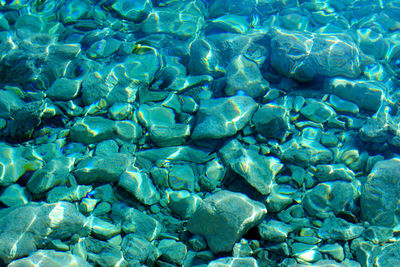 Full frame shot of rocks in swimming pool