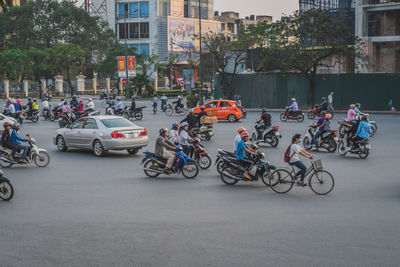 Bicycles parked on road in city