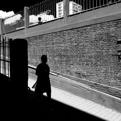 People walking on railroad track