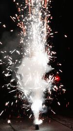 Firework display at night