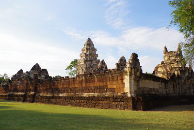 View of temple against buildings