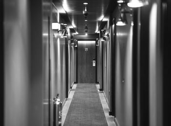 Illuminated corridor of building