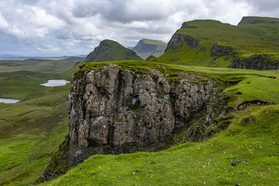 Lakes, cliff, blue sky with clouds in quiraing isle of skye scotland