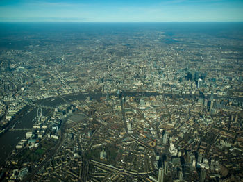 High angle view of buildings in city against sky