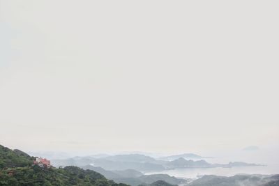 Scenic view of mountains against sky during winter