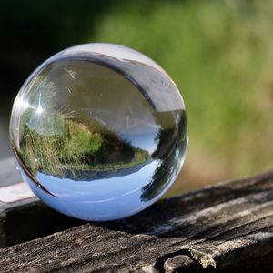 Close-up of crystal ball on glass