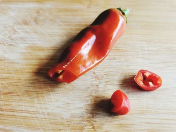 High angle view of red chili peppers on table