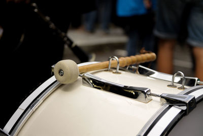 Close-up of drumstick on drum