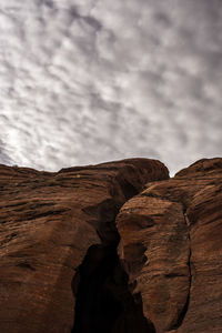 Sand dunes in desert against sky