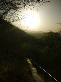 Scenic view of landscape against sky during sunset