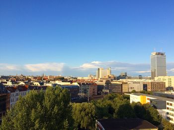 High angle view of buildings against clear sky