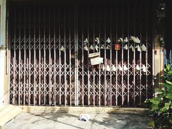 Row of metal gate against building