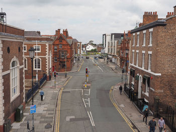 High angle view of street amidst buildings in city