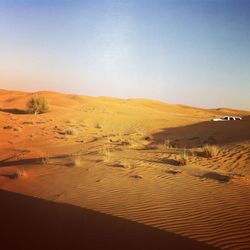 Scenic view of desert against clear sky