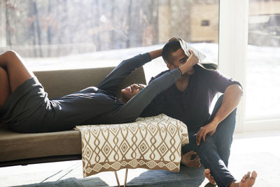 Playful couple at home