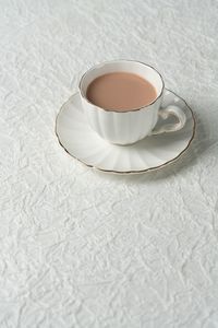 High angle view of coffee cup on table