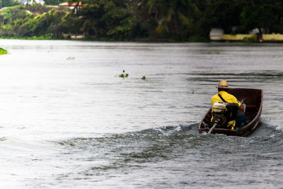 Man sitting in river