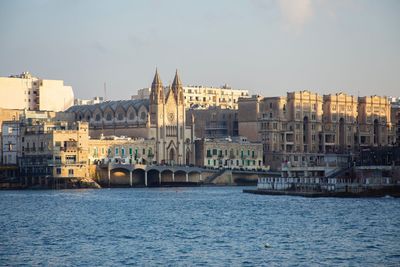 View of buildings by river