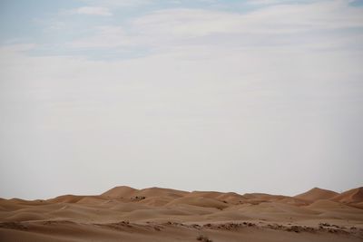 Scenic view of desert against sky