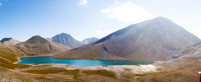 Panoramic view of lake and mountains against sky