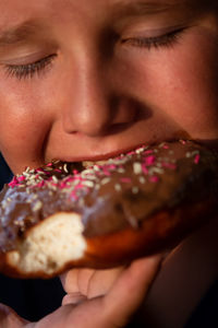 Close-up of woman eating ice cream