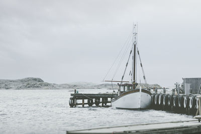 Sailing boat moored at jetty